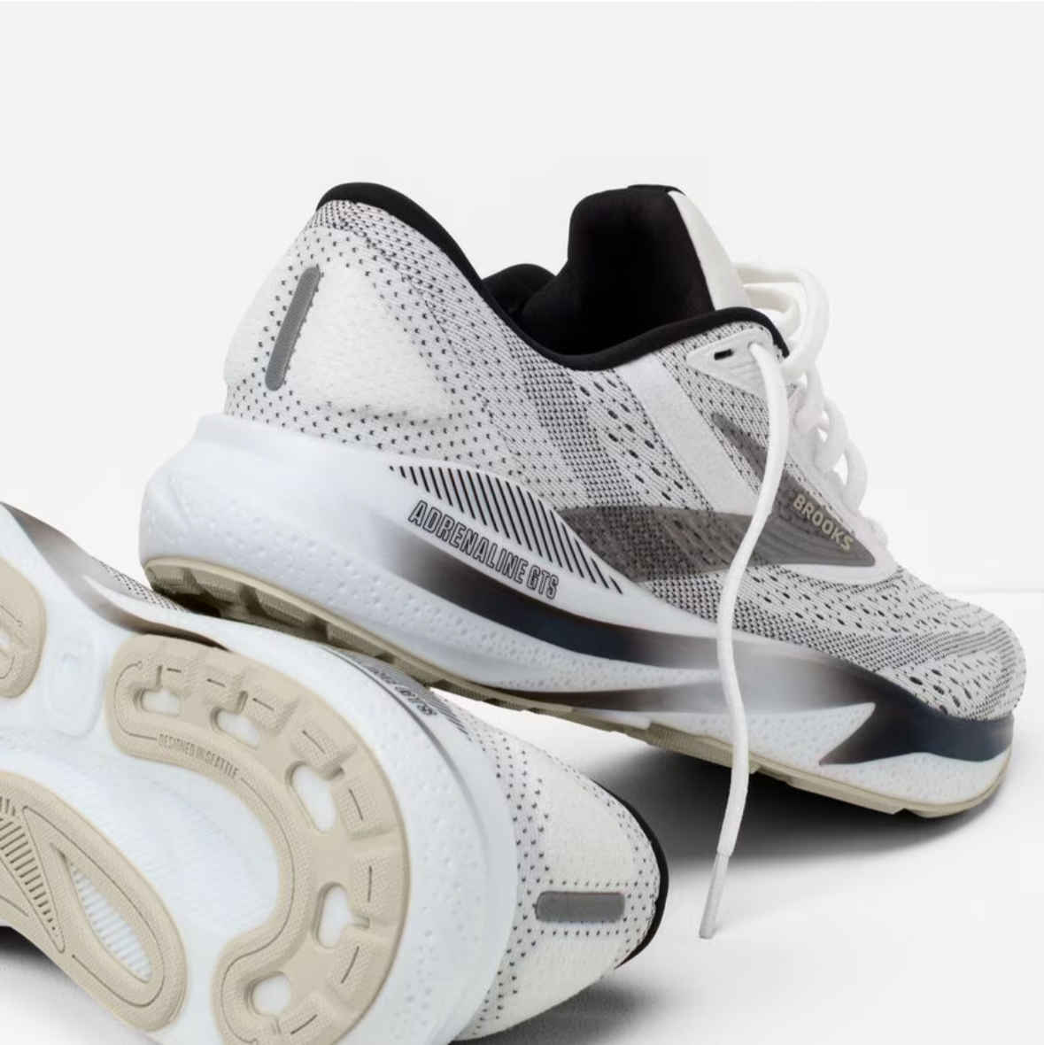 Brooks running shoes displayed on a website with color selection options.