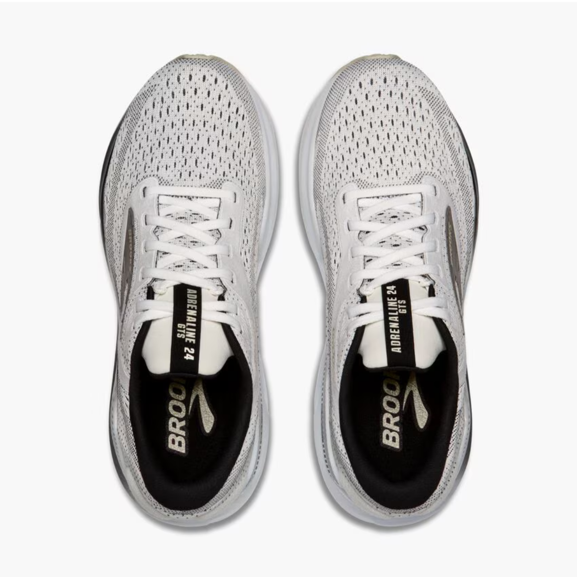 White running shoes with black accents on a Brooks website page.